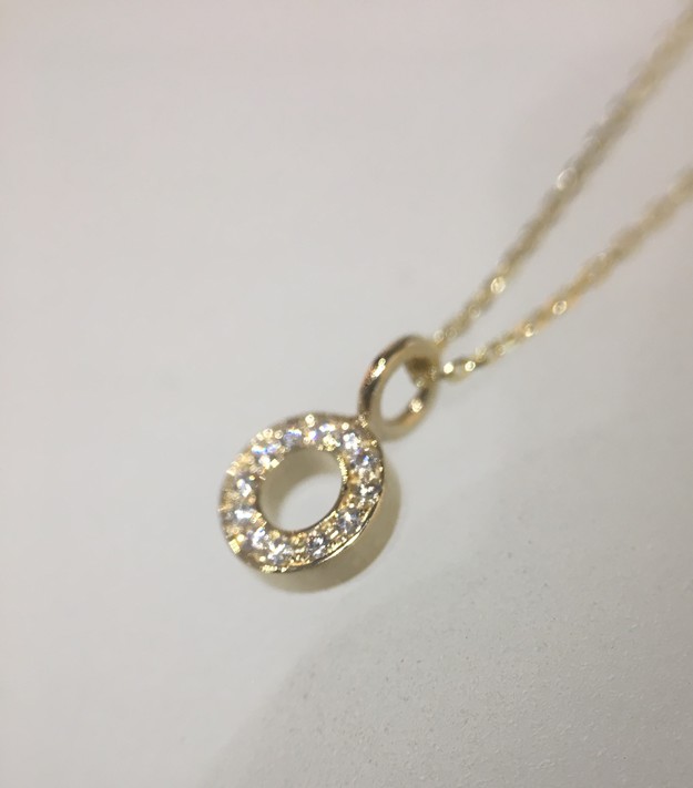 Yellow gold diamond pendant with micropavé set diamonds